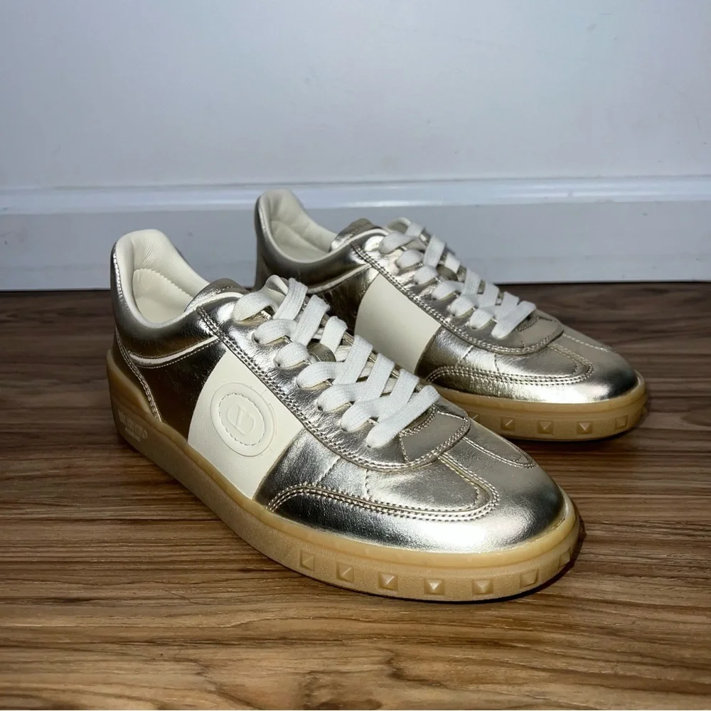Valentino Garavani Women’s Upvillage Trainer Sneakers in Laminated Calfskin Gold